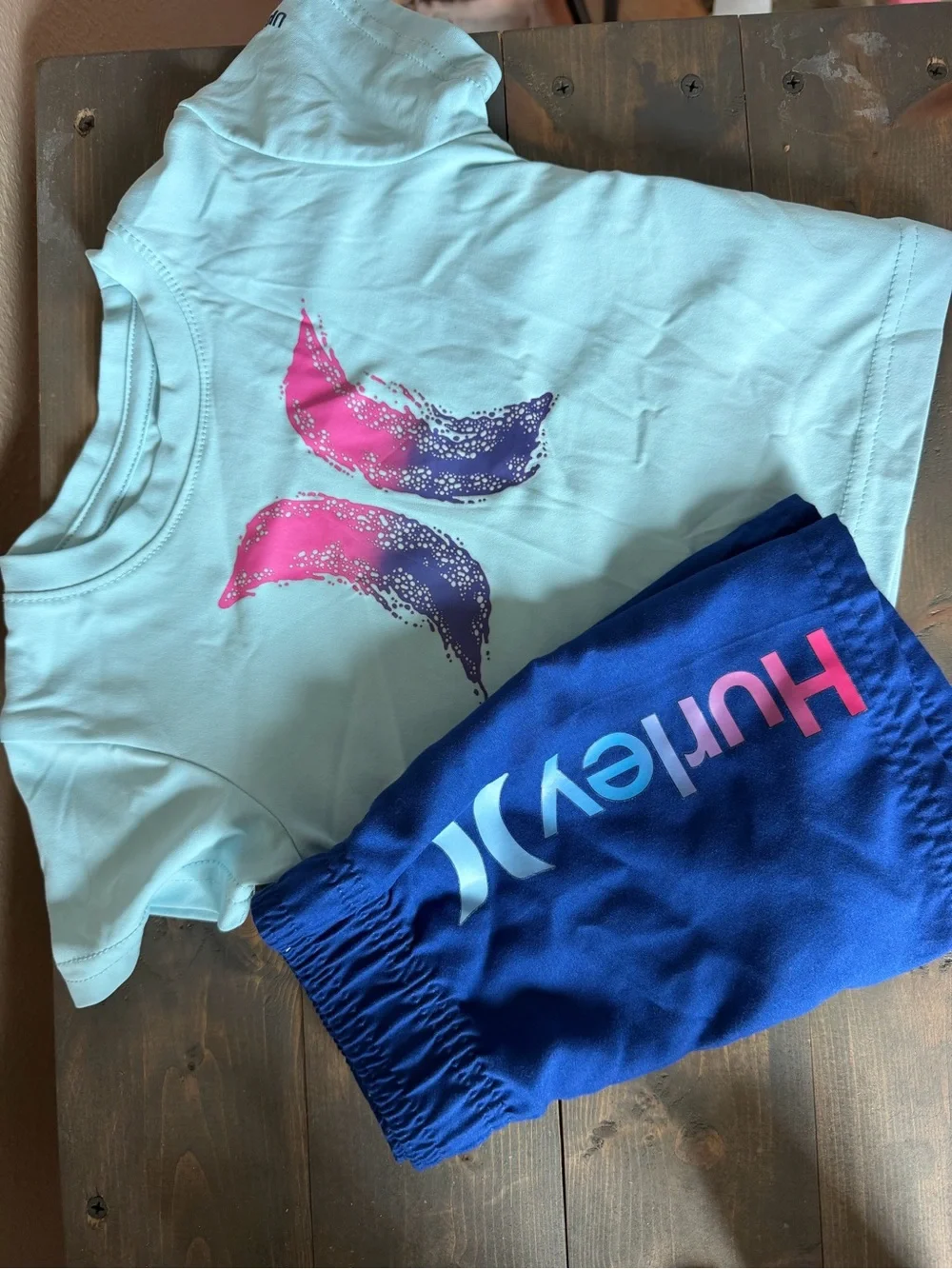 Hurley Light Blue swim shirt and swim shorts